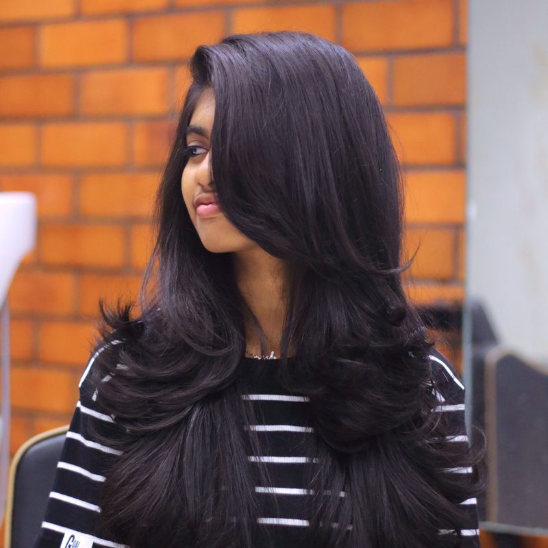 Toffee brunette colour with soft dimension through the mid-lengths