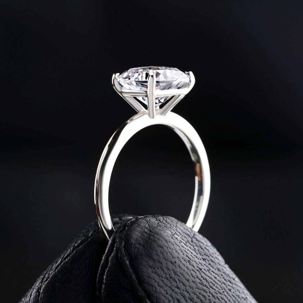 The Vine Solitaire: a 1.62 carat old-European cut diamond in a hand-carved platinum vine shank